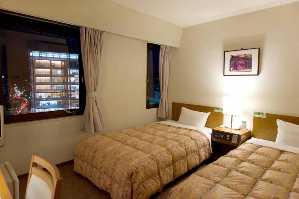 Hotel Keifuku Fukui Ekimae Habitación foto